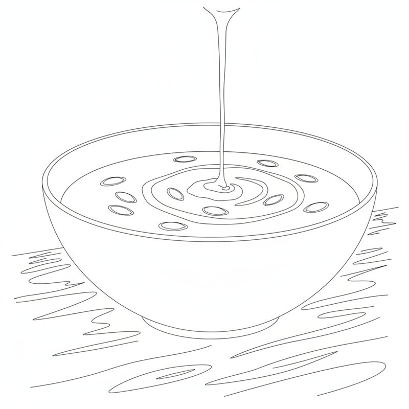 Illustrasjon: ferdig gresskarsuppe i skål med kokosmelk og kjerner på toppen